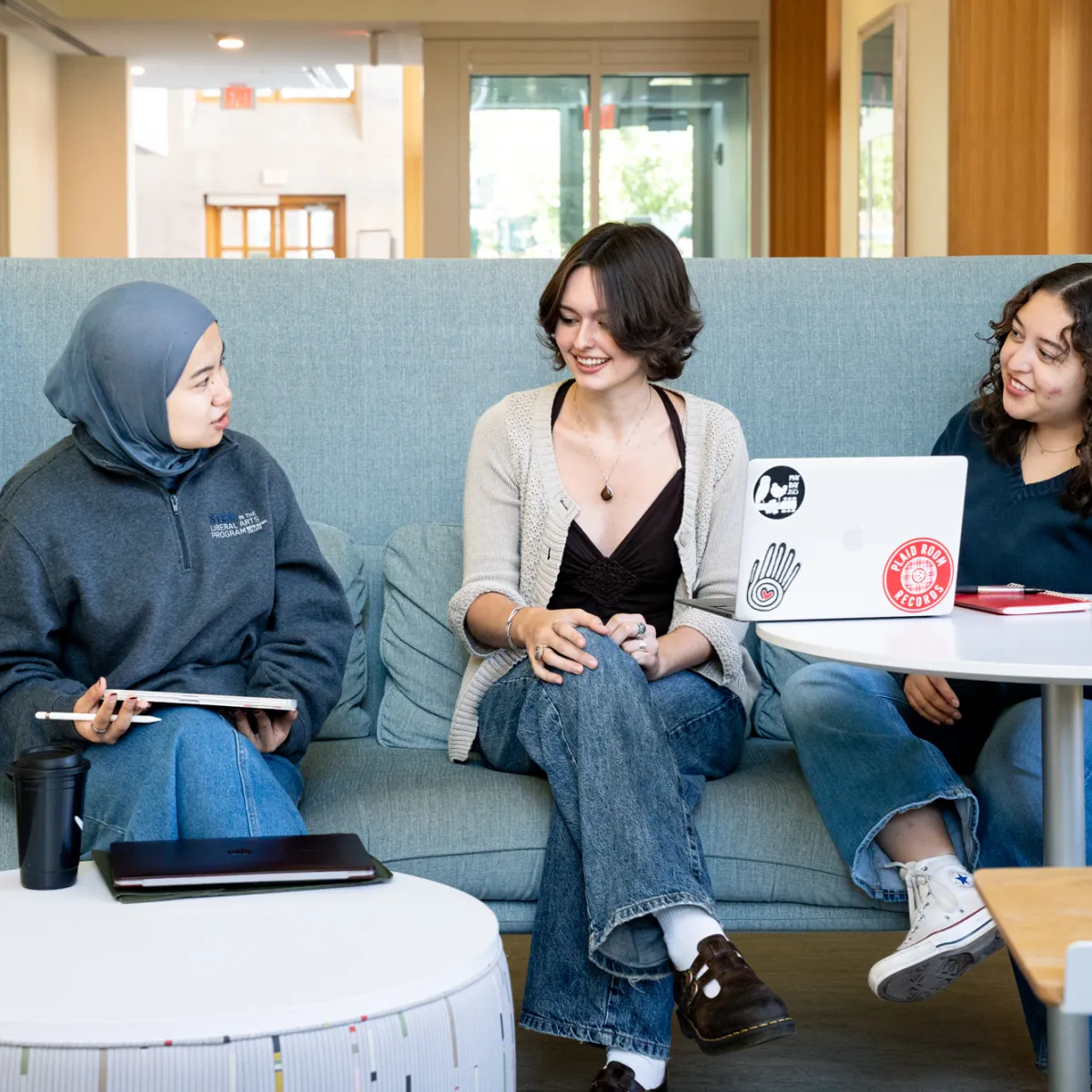 Students sitting and talking at a table