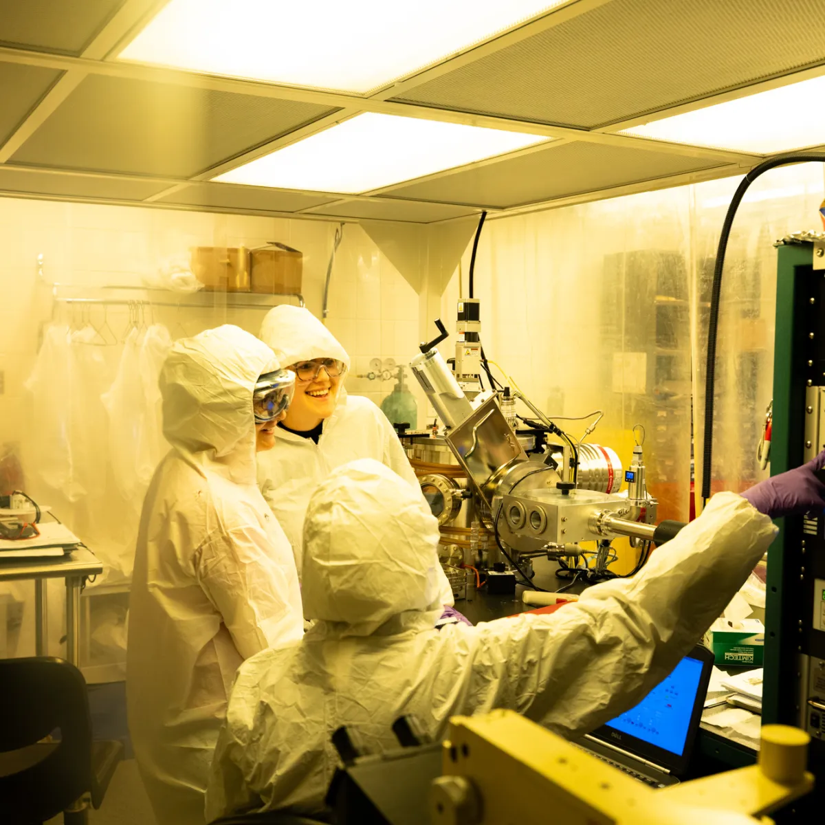 Stem professor showing students lab techniques