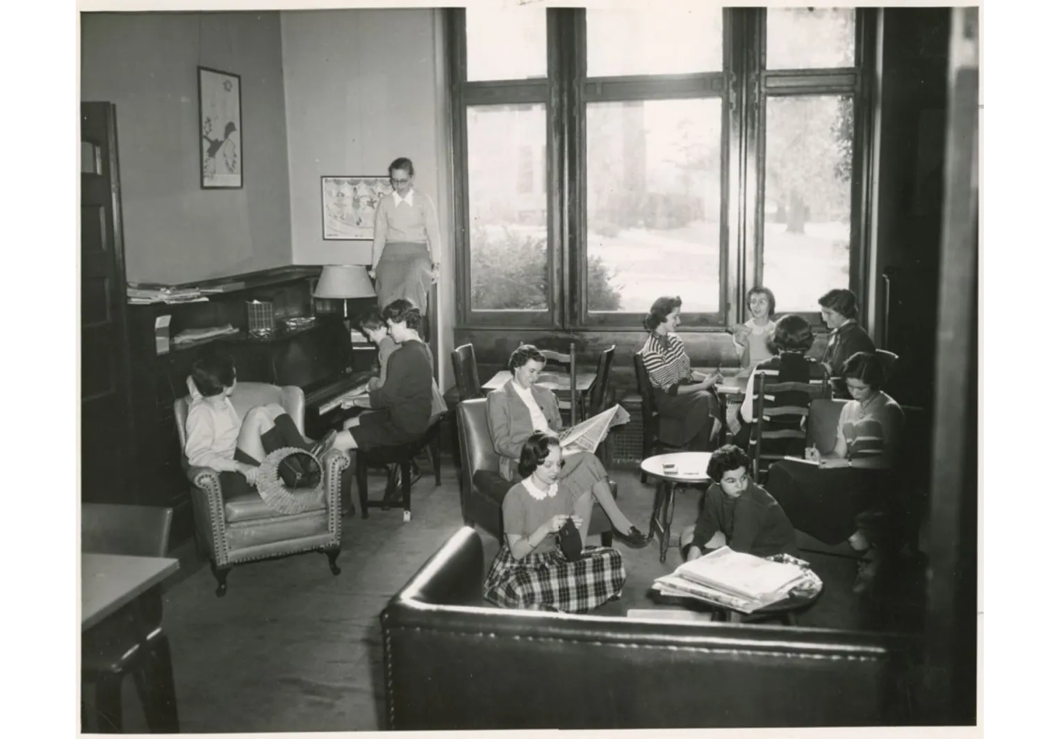 Students in the 1950s lounging in a back smoker