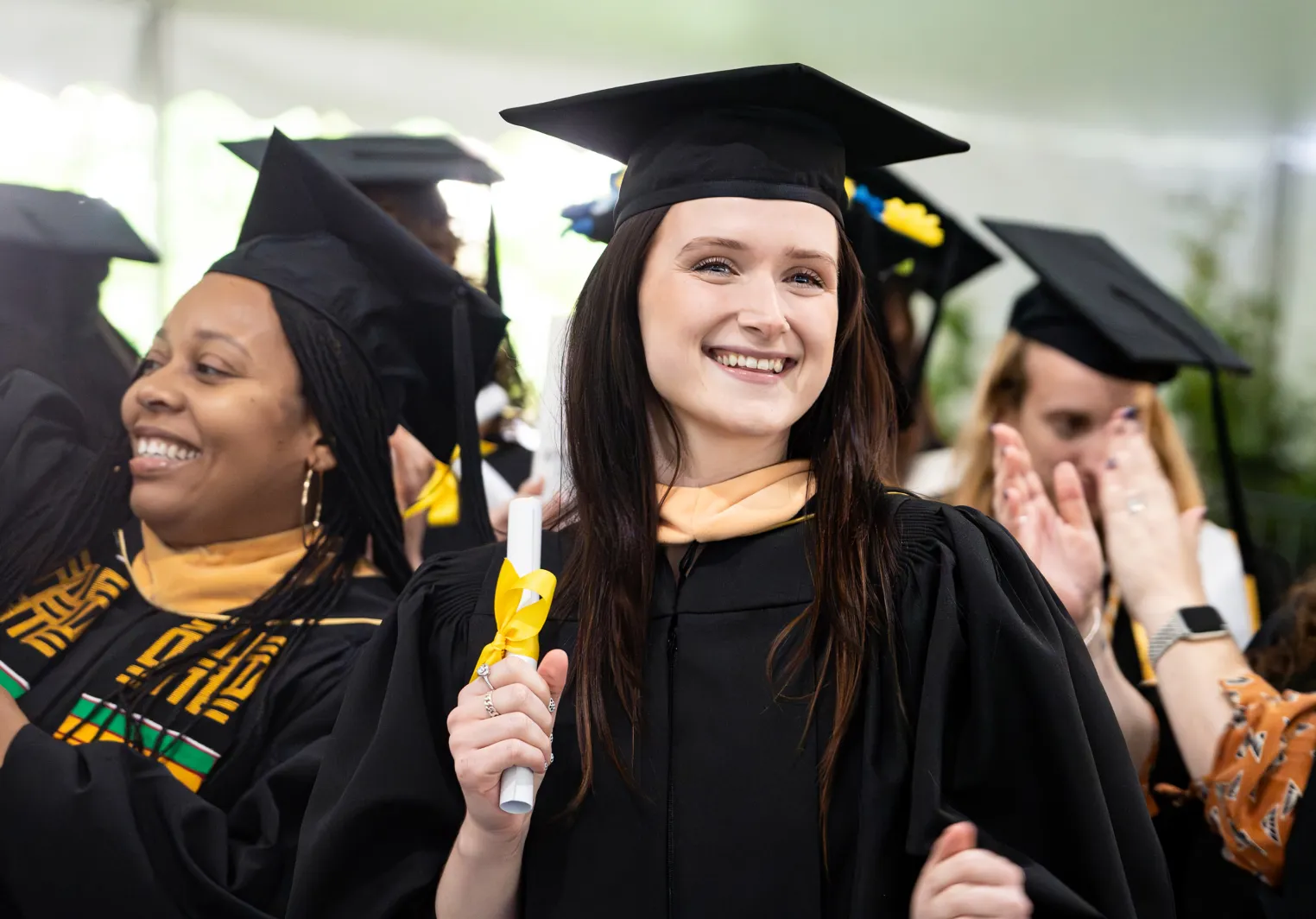 A Bryn Mawr College student graduating with a masters degree