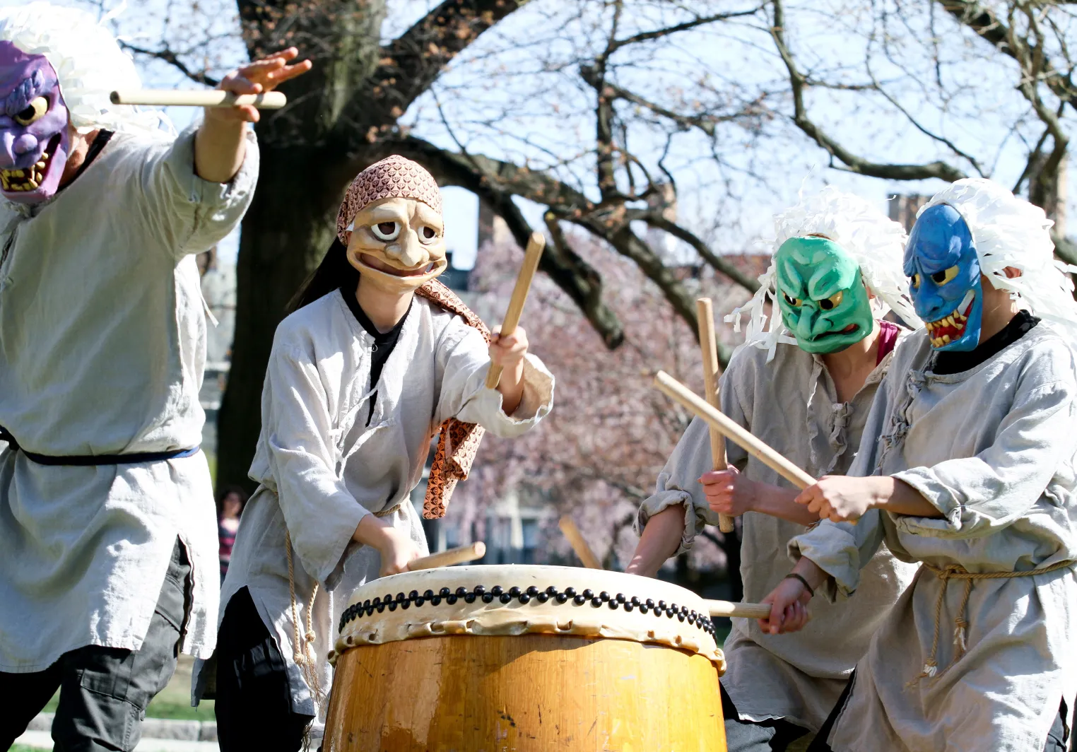 A group of Japanese drummers in demon masks at Bryn Mawr College