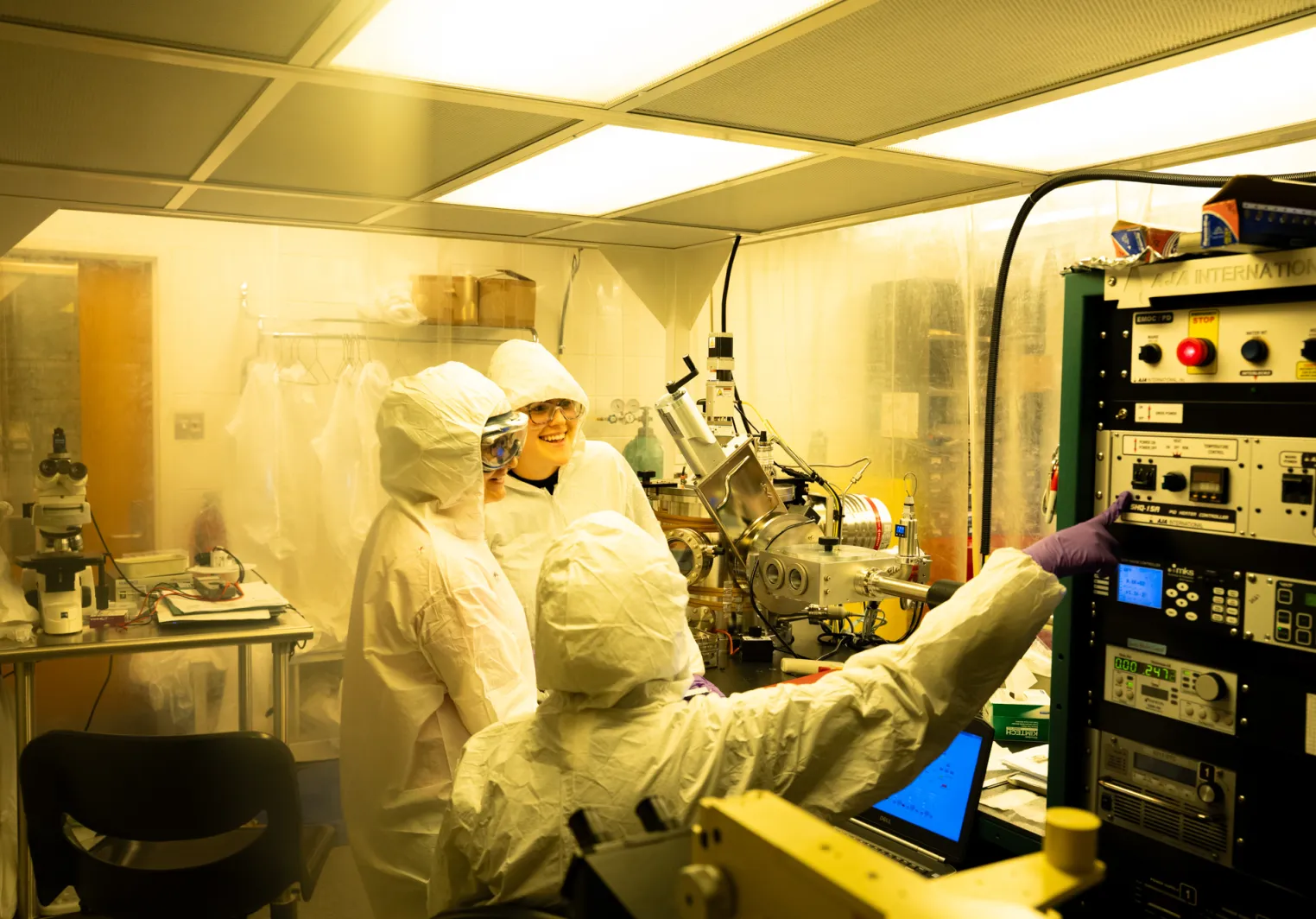 Stem professor showing students lab techniques