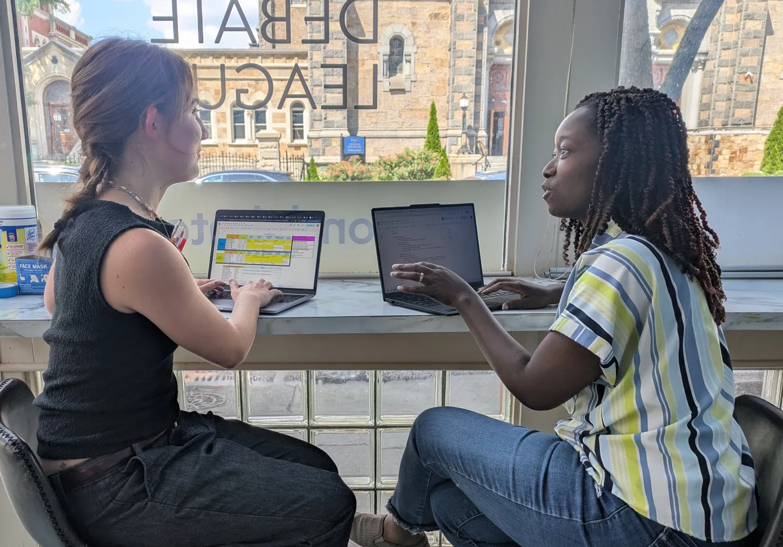 student working with an alumnae