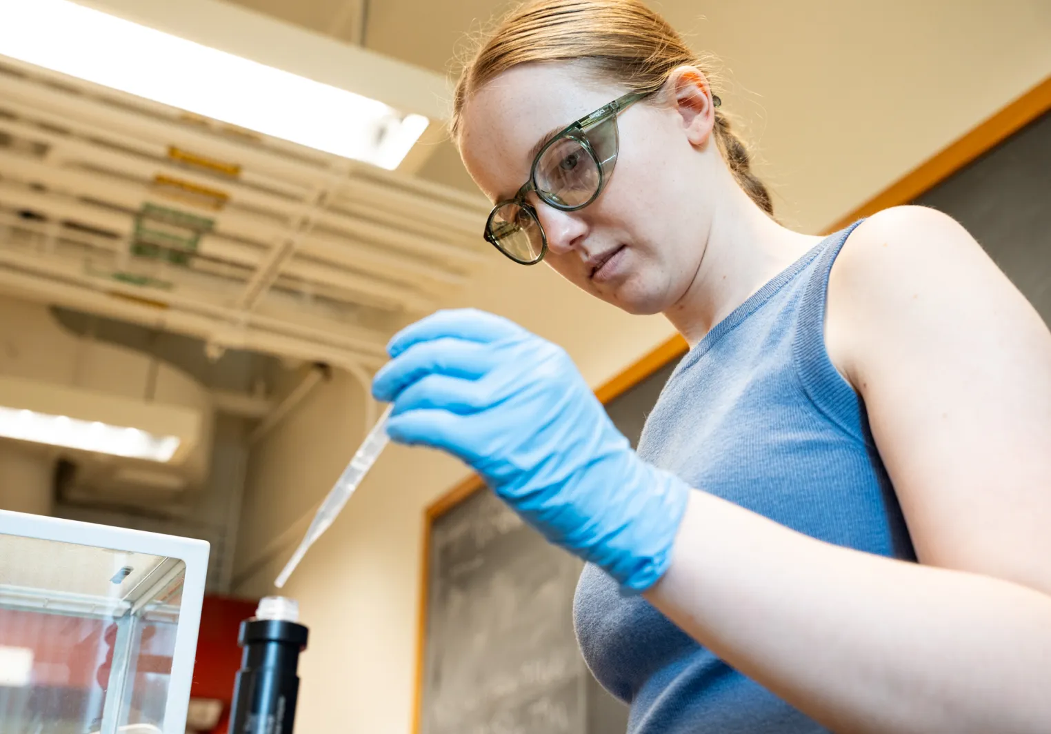 student in the lab during a summer science research session