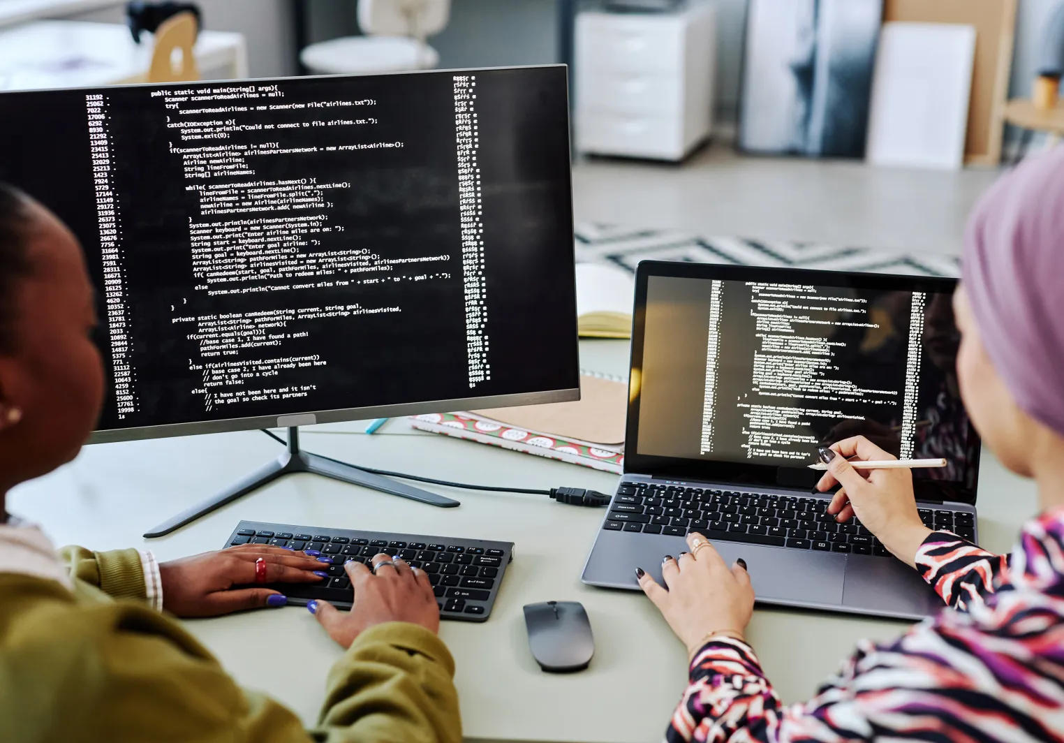 Data science two women write code