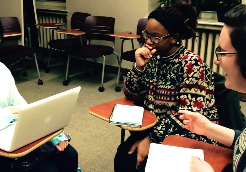 Three TLI participants in conversation