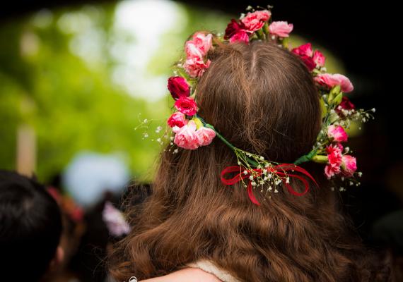 Student wearing a flower crown on May Day