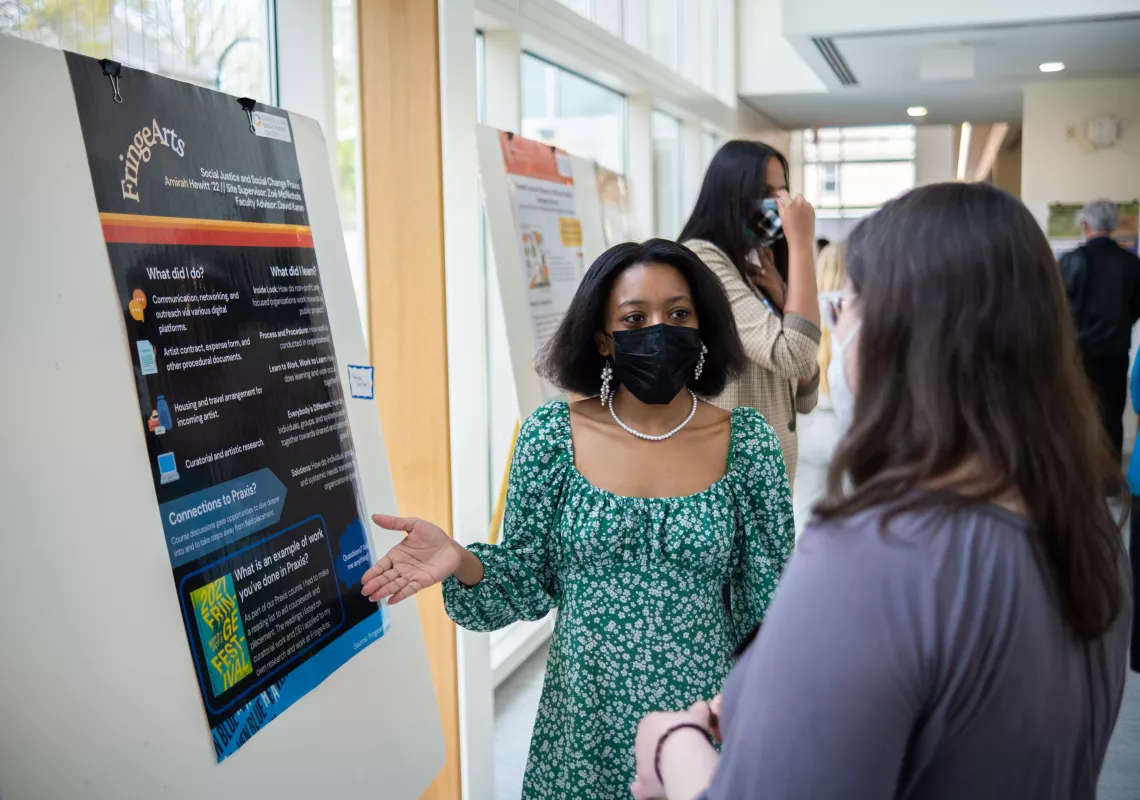 Students attending the Praxis Poster Session 2022