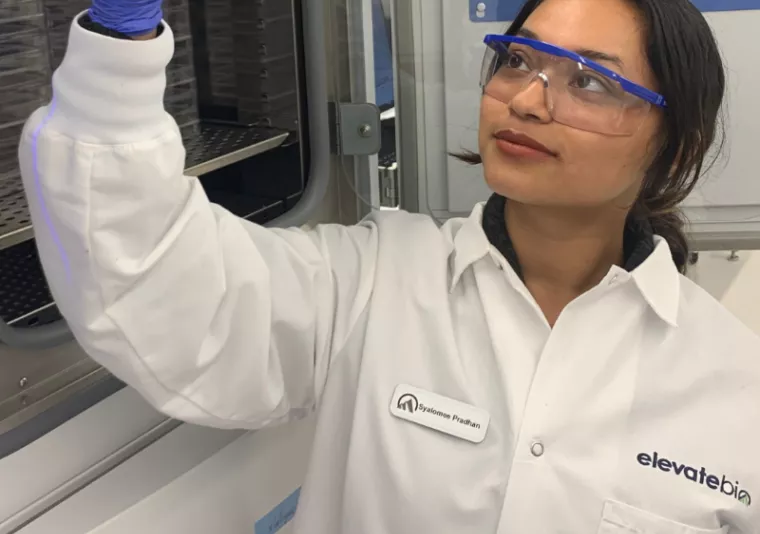 Pradhan doing internship research in a lab
