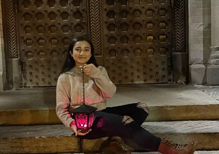 Maha Attique sitting on Goodhart steps