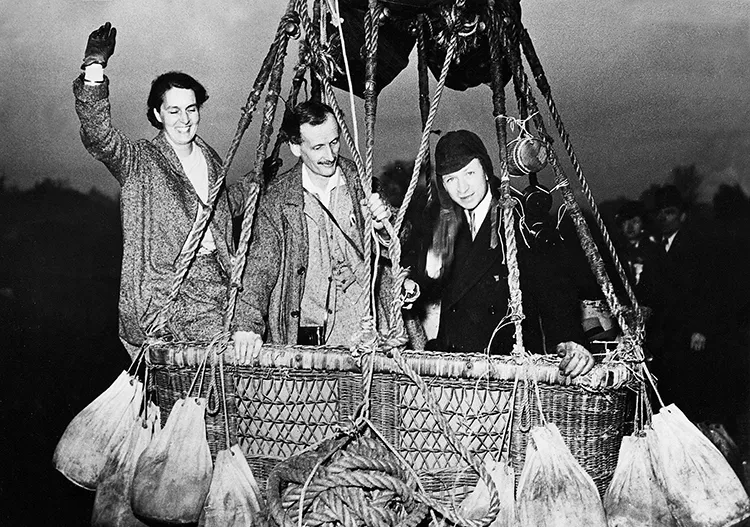 The Piccards (left and center) with Edward J. Hill before a test flight, May 1934.