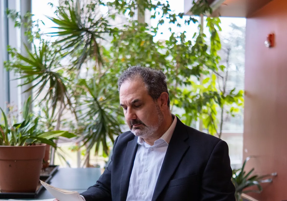 Marc Schulz looking at papers
