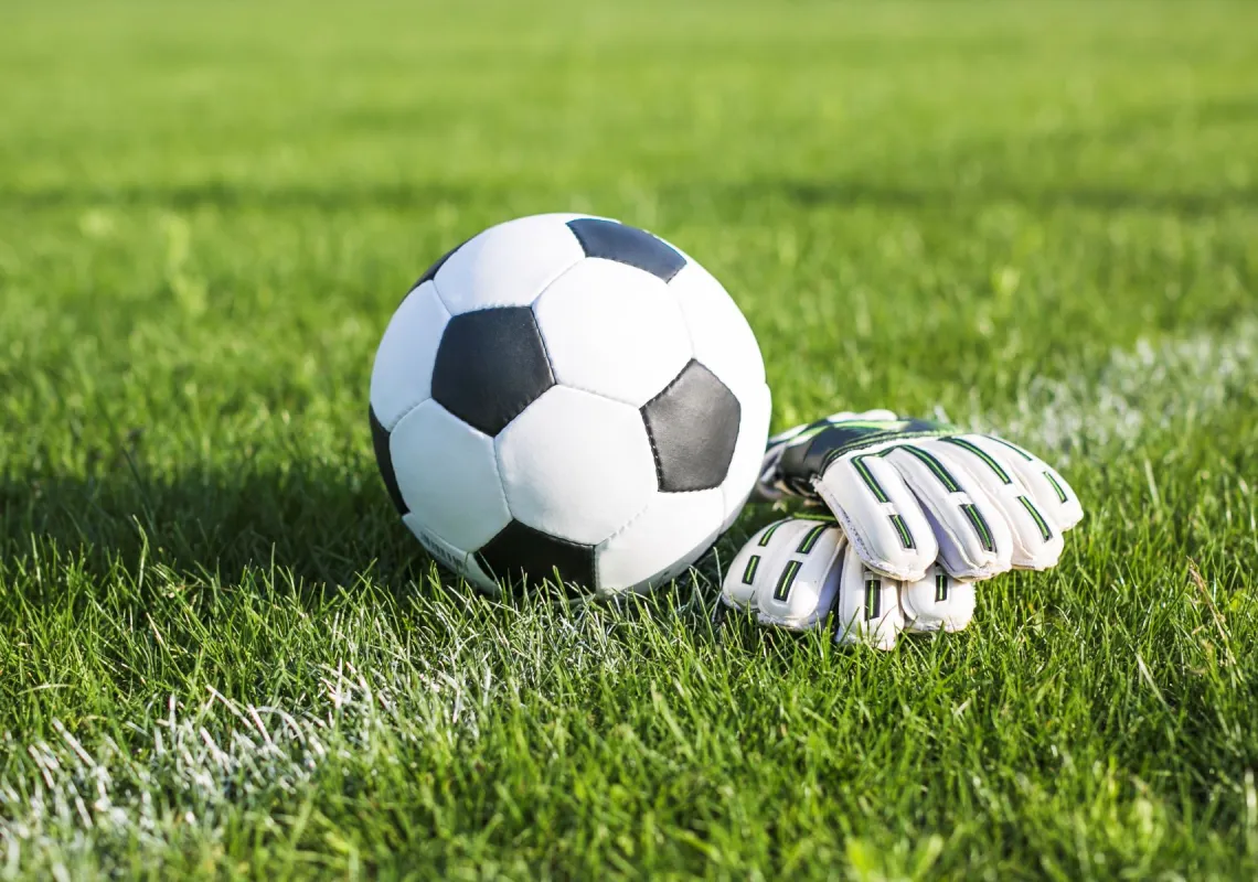 Soccer ball with gloves