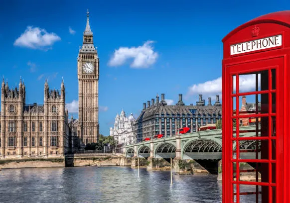 An image of London with a red phone booth in front of Big Ben
