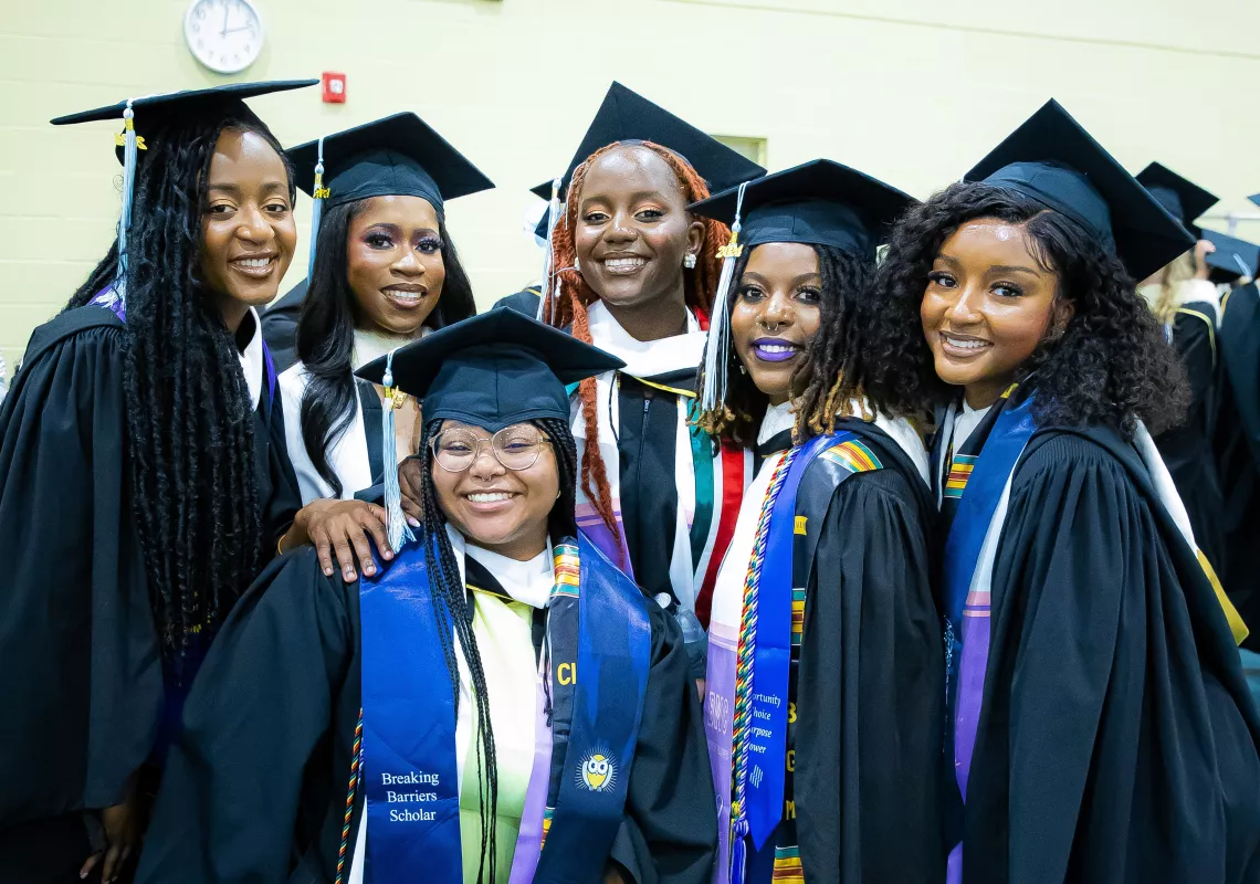Commencement students in cap and gown