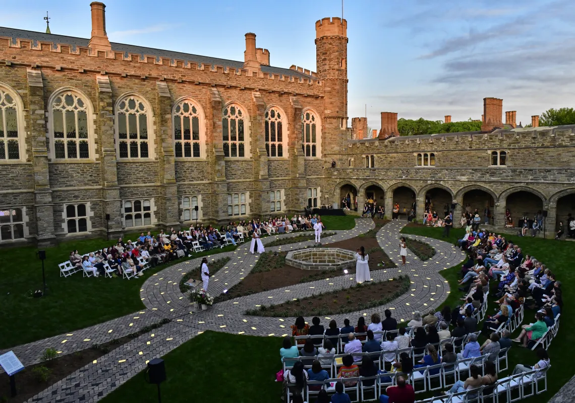 The crowd gathered in the evening in the Cloisters for the unveiling of Don't Forget to Remember (Me).