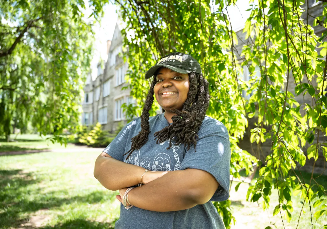 Tay Jones portrait under green trees
