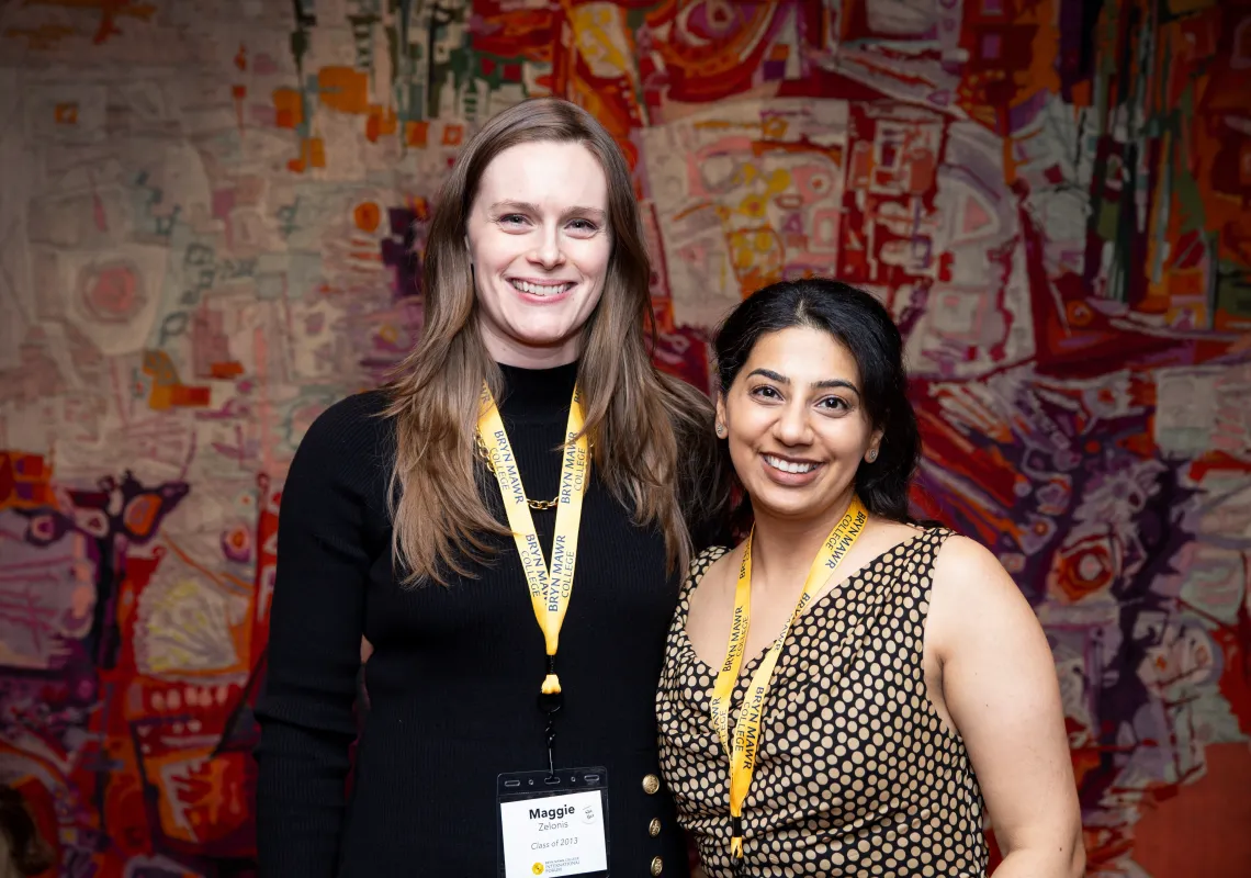 2013 classmates and volunteers Maggie Zelonis, Madrid Club President, and Bhakthi Sahgal, former GOLD Committee Member, reunite in London.