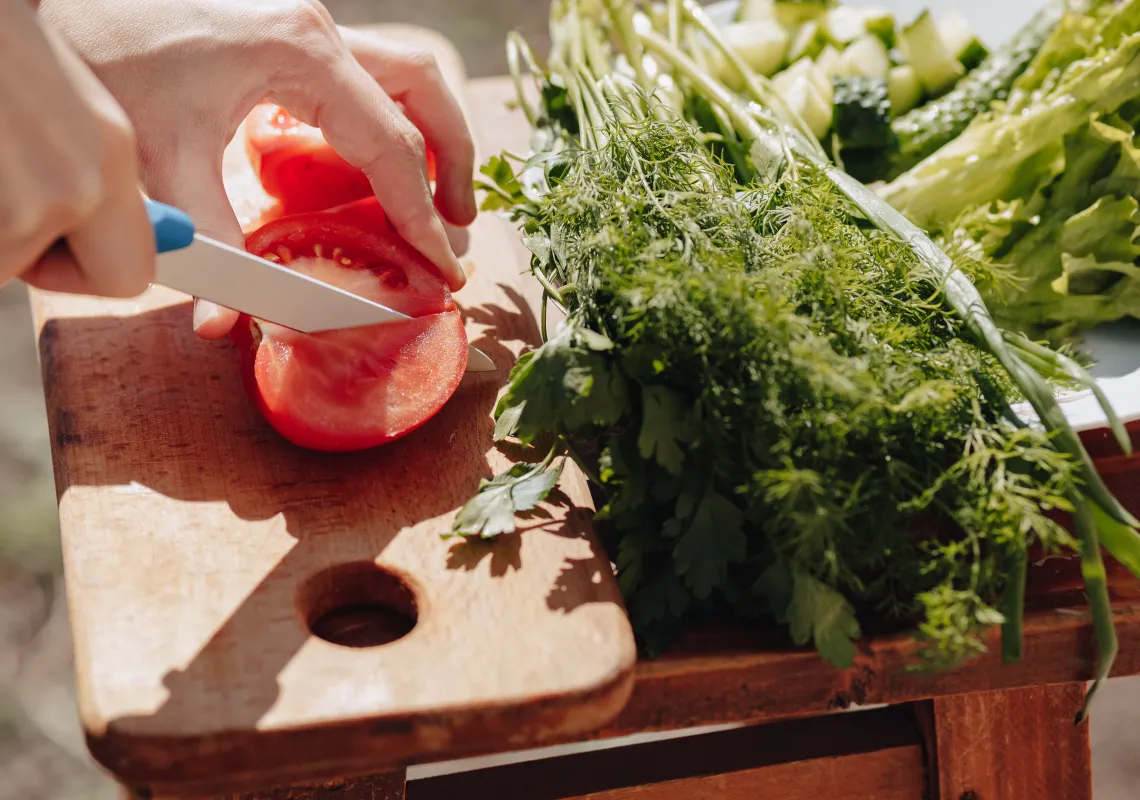 Photo of slicing a tomato
