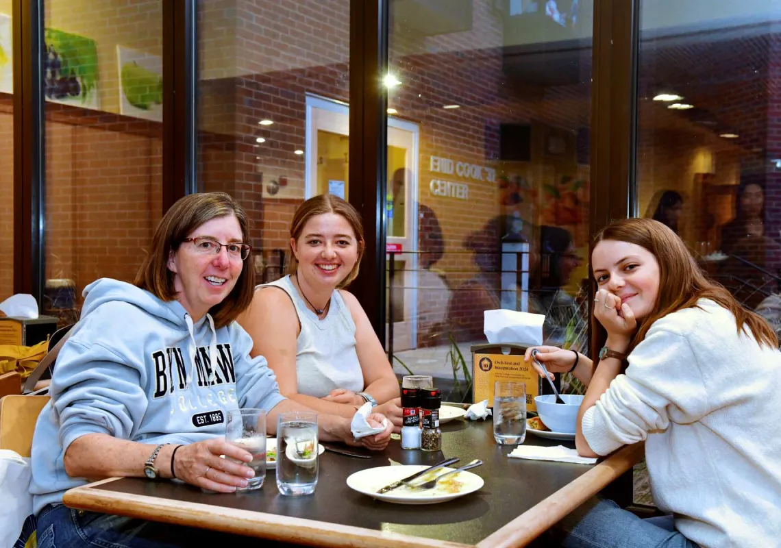 People sitting at a table eating