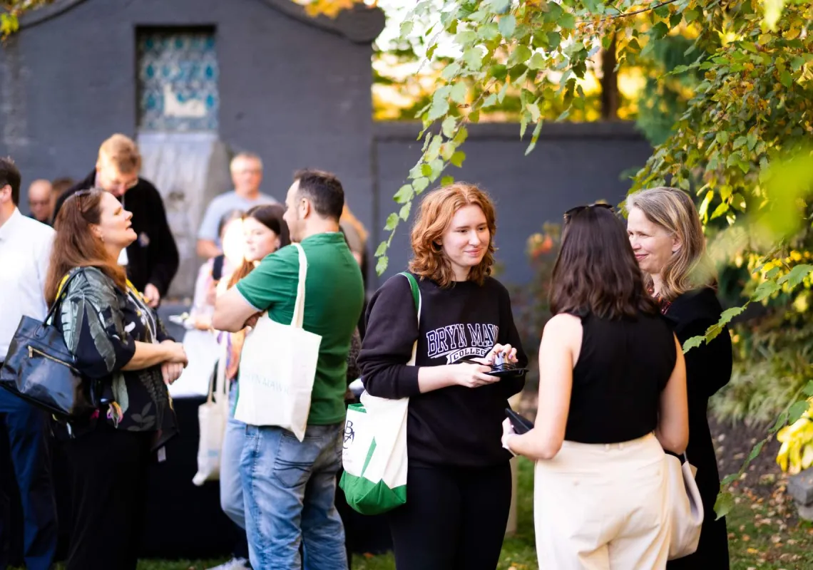 People talking in a garden