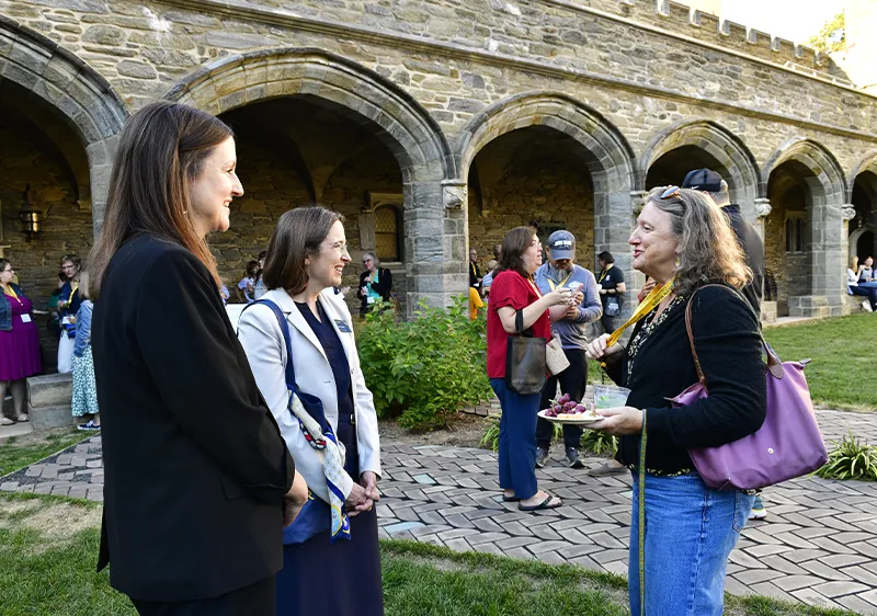Wendy in the Cloisters talking to an alum at Owls Fest