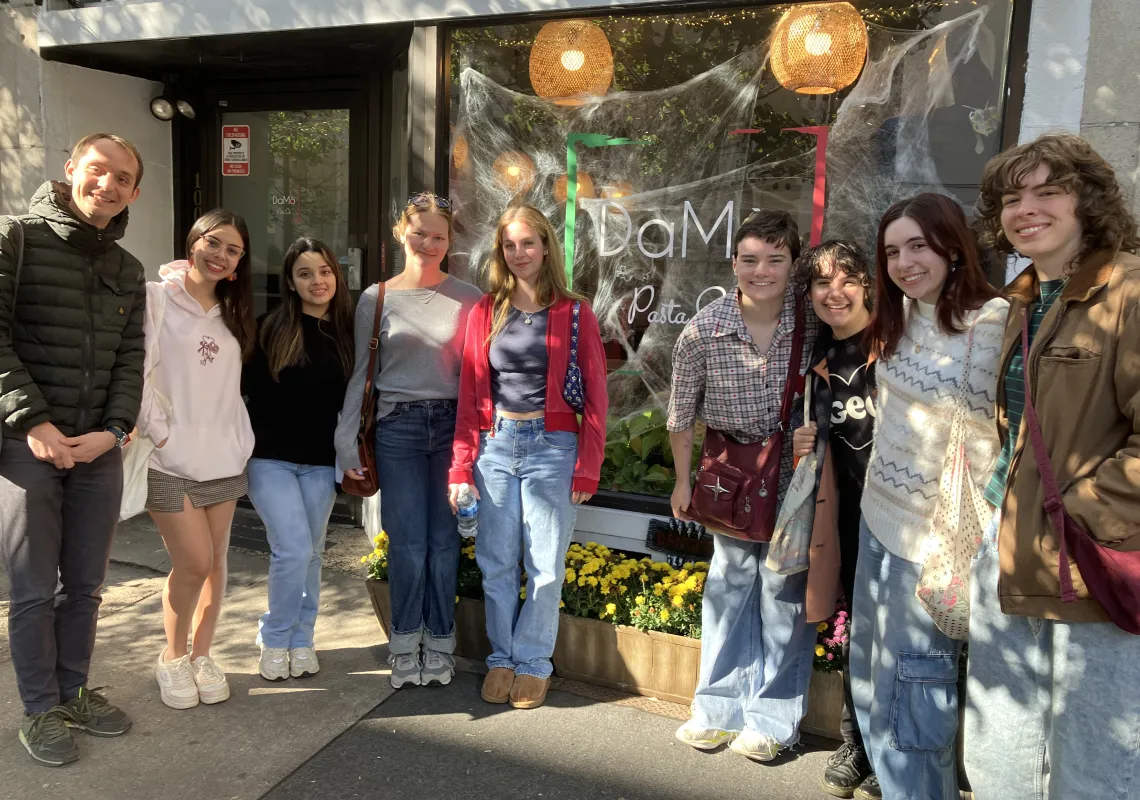 Students outside a restaurant on an Italian field trip