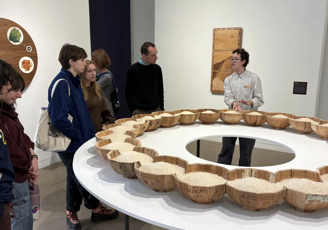 Students looking at exhibit at the Museum for Art in Wood.
