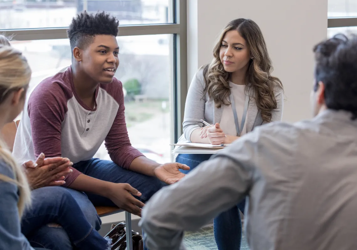 Teenage group psychotherapy session