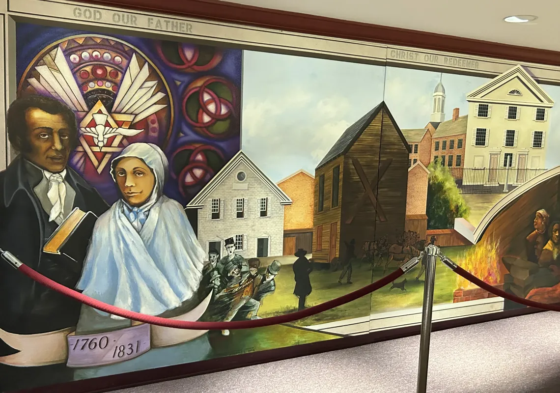 Mother Bethel A.M.E. Church - Image of mural of Founder Richard Allen and his wife, and the different buildings that the church called home. Photo taken by Tanya Hoard