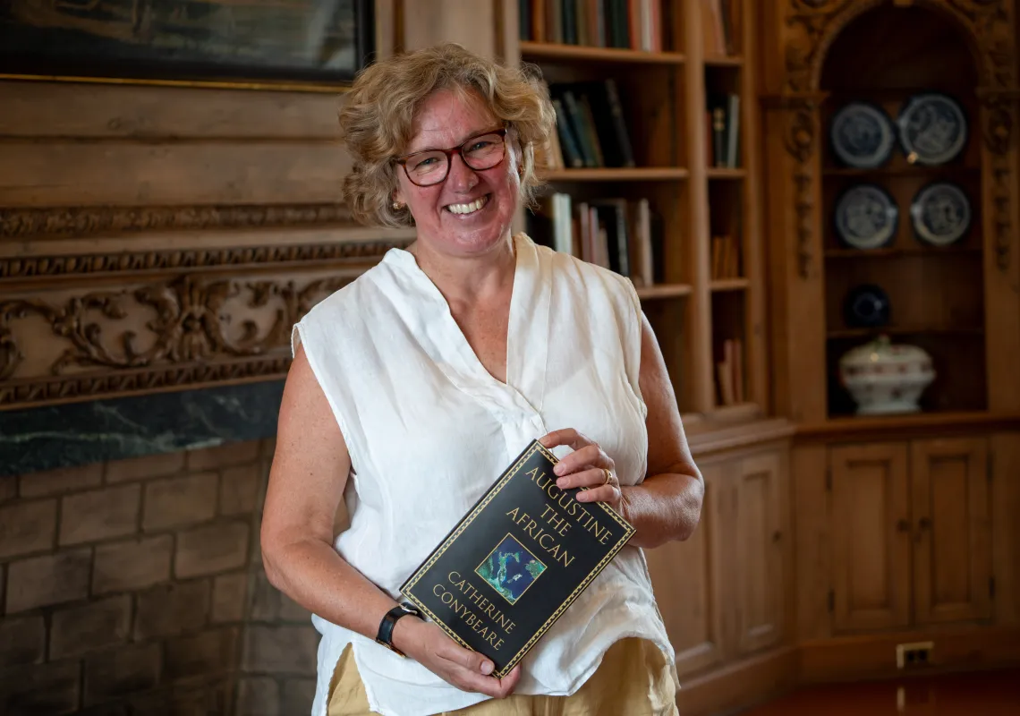 Catherine holding her book