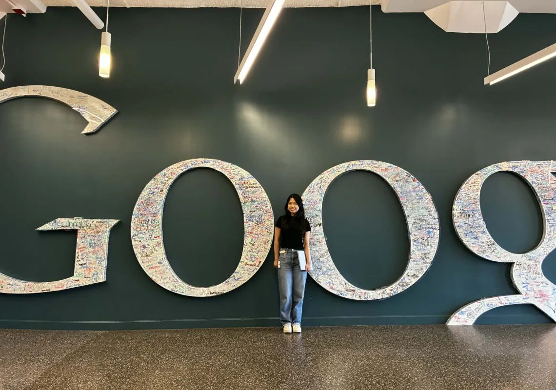 Khanh Ha in front of the Google logo