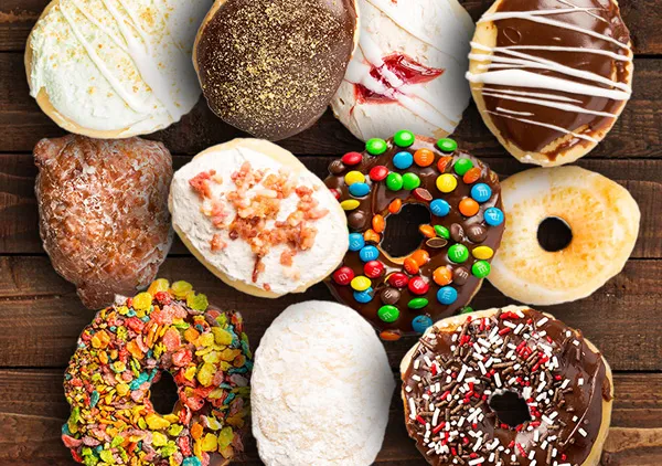 Twelve colorful donuts arranged in a square