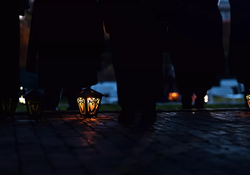 A lit lantern at Lux Doctorum