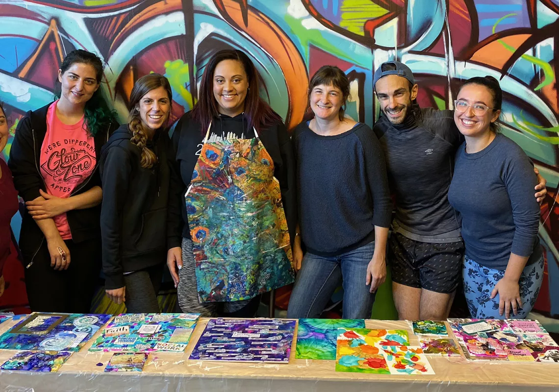 GSSWSR Lecturer Meagan Corrado (center) and students from her "Social Work, Trauma, and the Arts" course.