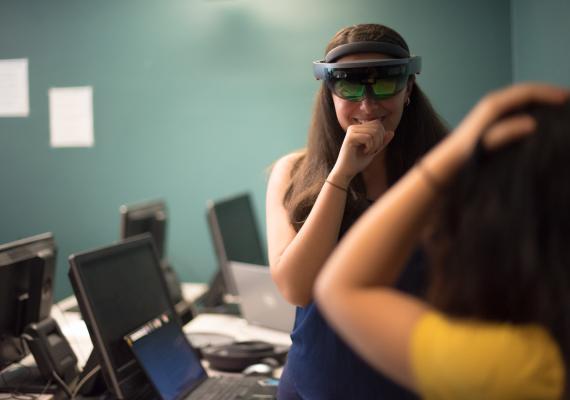student interns with Microsoft HoloLens