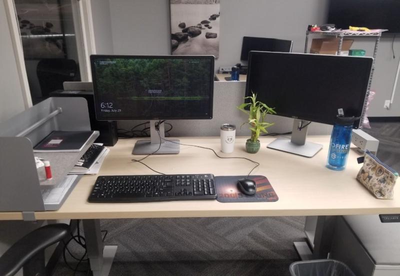Rixzelle Romero's internship desk with two computers
