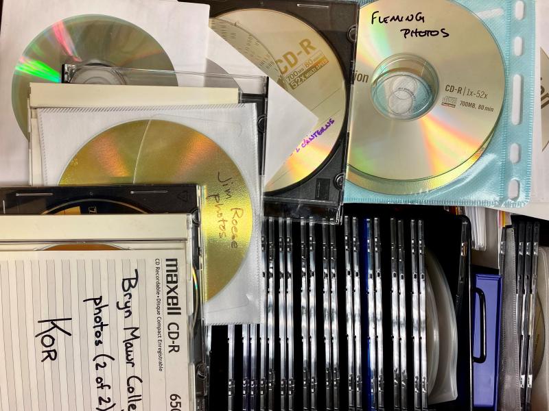 Photograph of the interior of a banker's box, filled with CD-Rom disks.