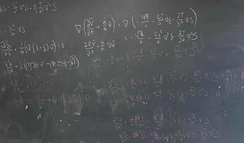 Blackboard with derivations written in chalk