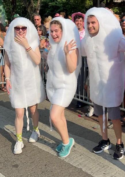 Three people in tampon costumes. 