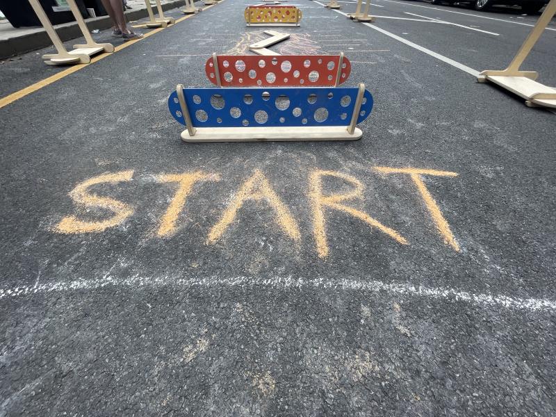 "START" written in chalk on a street. 