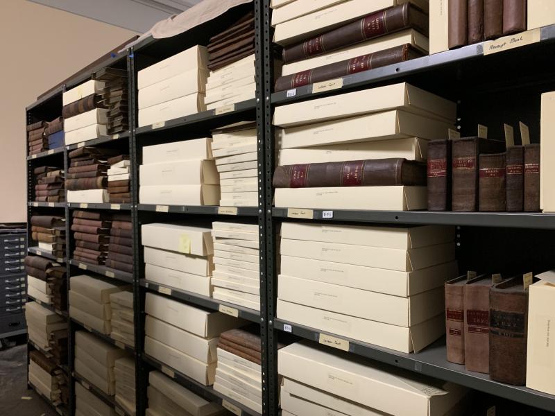 Shelf of archival material. 