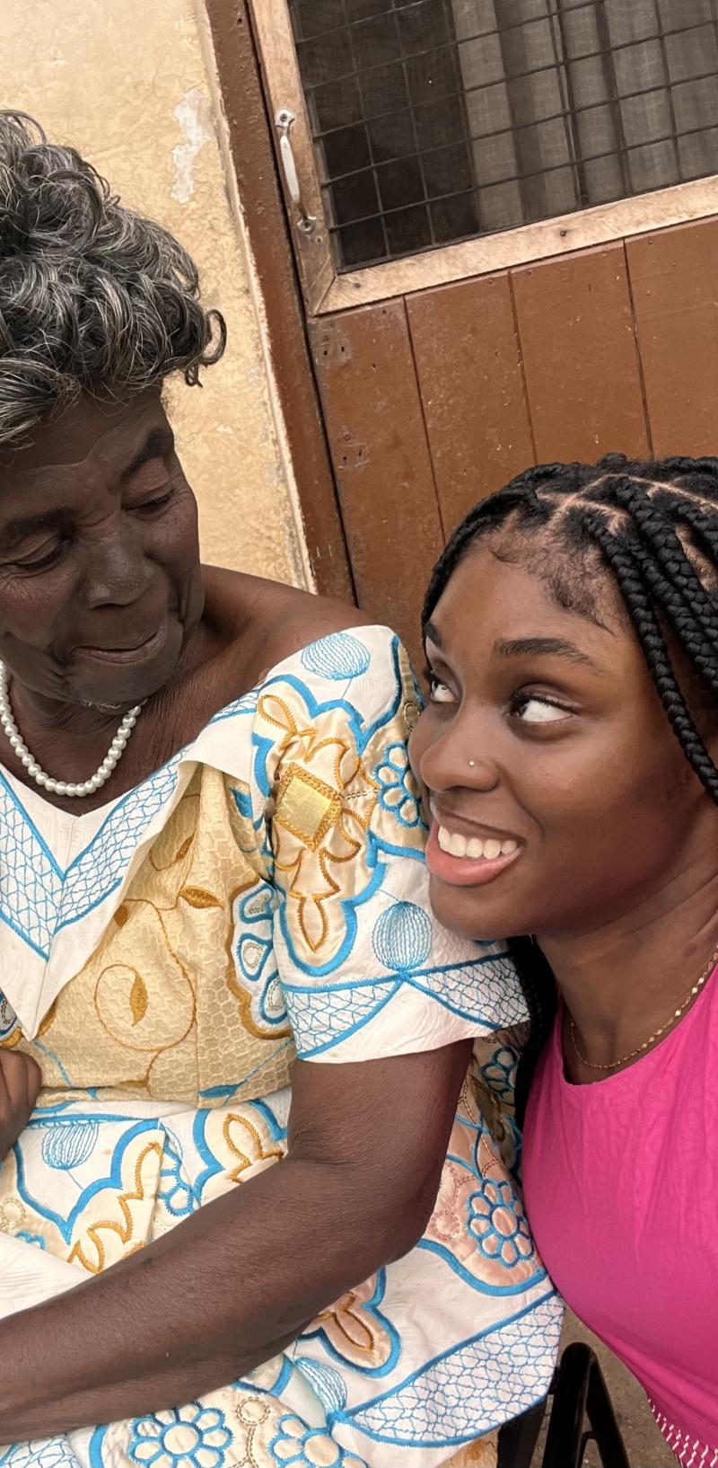 Siawaa smiling with her grandmother. 