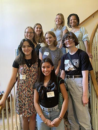 Eight students standing on a staircase during a Send-Off Party