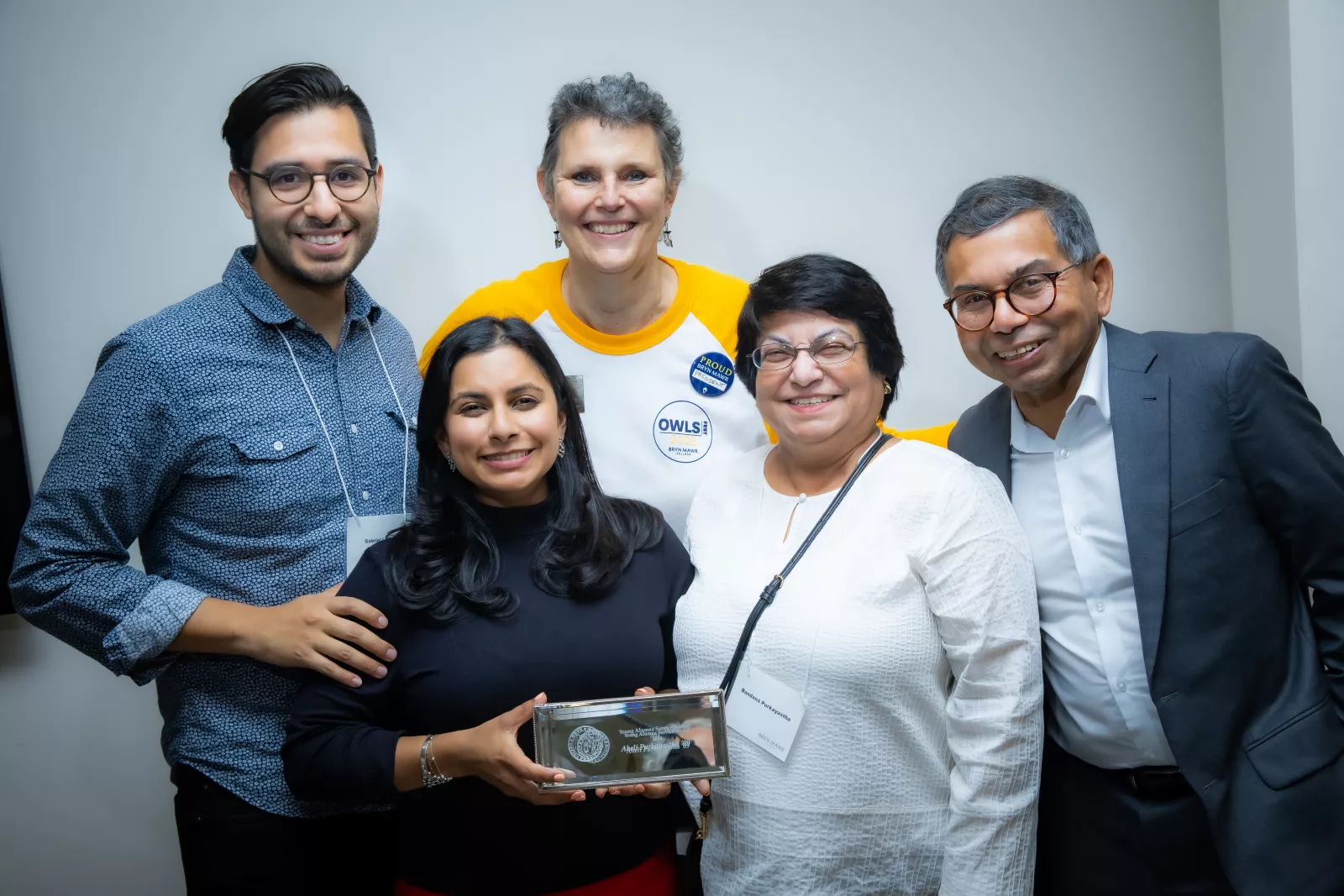 Aheli Purkayastha '09 and family with President Kim Cassidy
