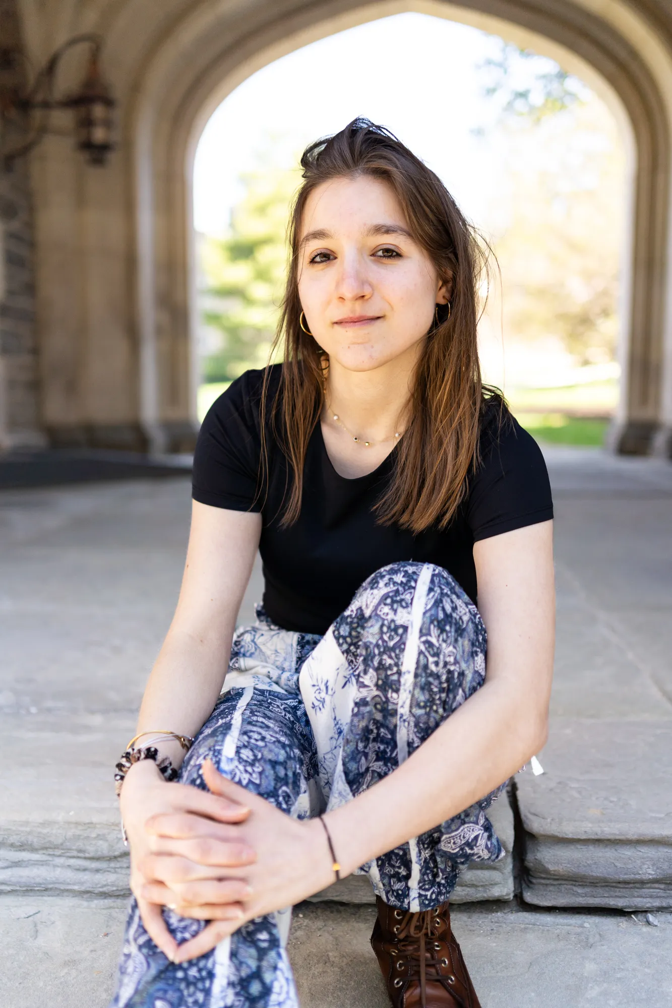 Eva sitting under Rock Arch