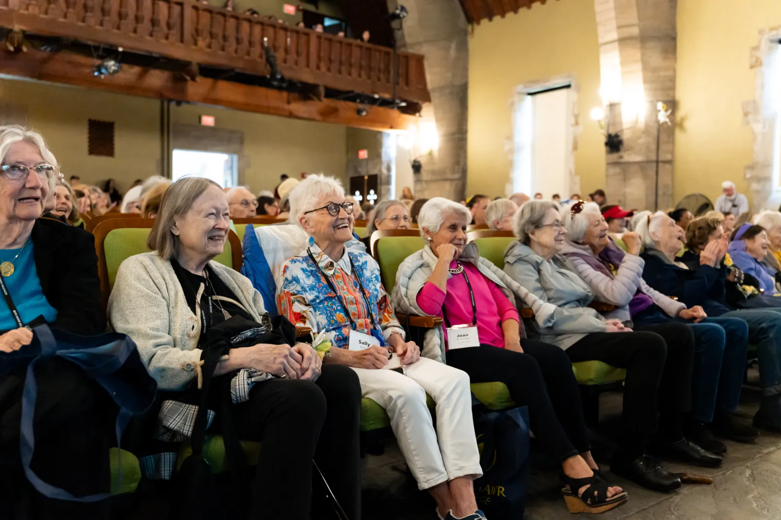 At Reunion 2025, classes from the 1950s and 60s watch Wendy Cadge speak in Goodhart.