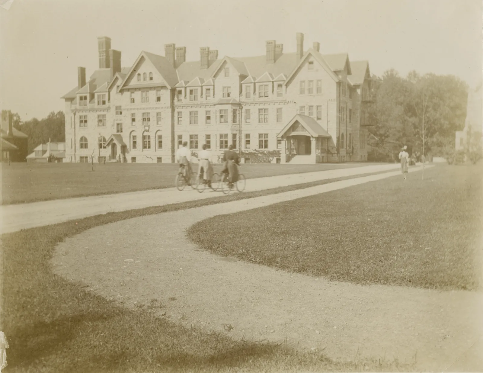 Students cycle near Merion Green