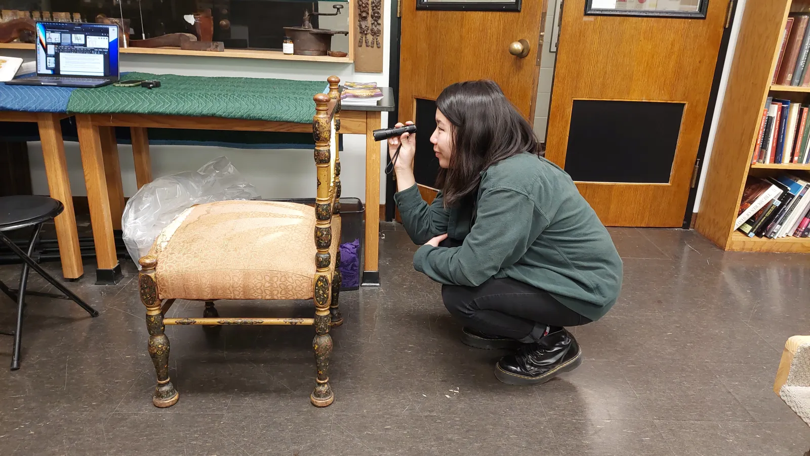 Winterthur student Caroline Shaver with a chair from the former Deanery at Bryn Mawr. 