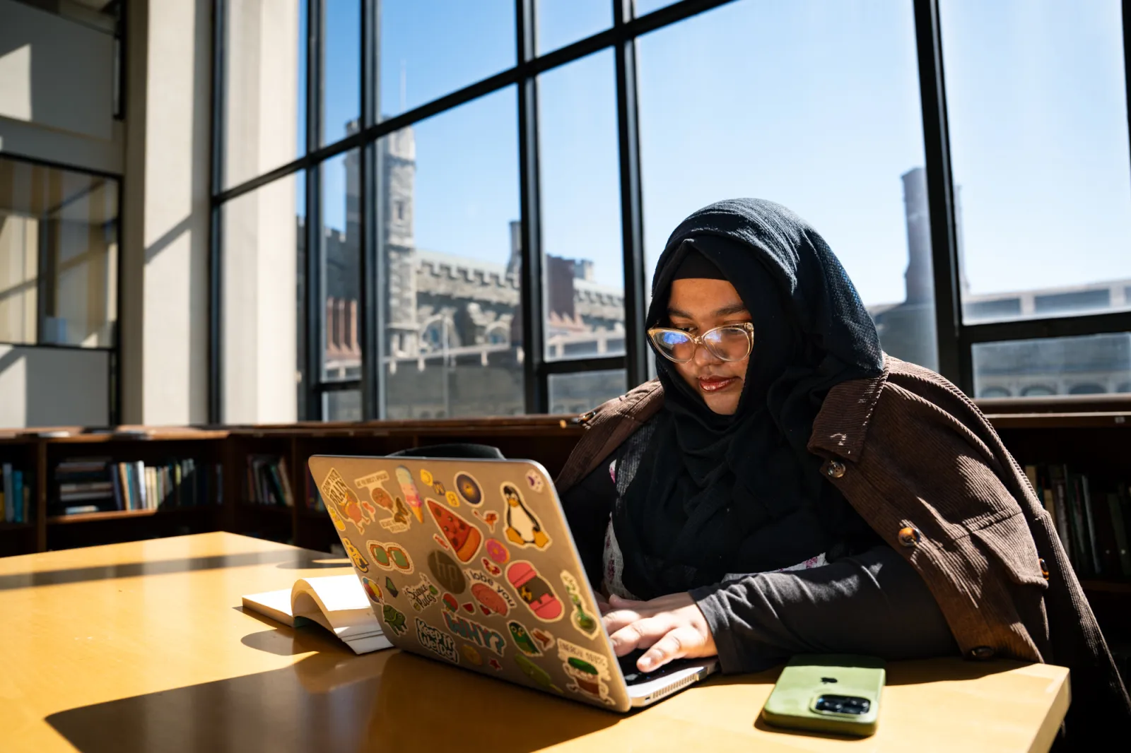 Student on computer in the library